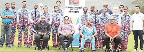  ?? (Pic: Mengameli Mabuza) ?? Team Eswatini posing for with Minister of Sports, Culture and Youth Affairs Harries ‘Madze’ Bulunga (C) and other officials, before their departure, at the Lobamba Technical Centre yesterday.