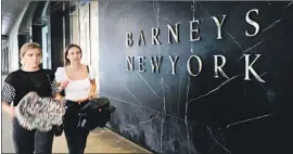  ?? Spencer Platt Getty Images ?? BARNEYS New York filed for Chapter 11 bankruptcy protection as it struggles in a relatively narrow market, where shoppers shell out thousands for a single dress.