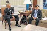  ?? Chip Somodevill­a / Getty images north america ?? incoming White House Chief of staff ron Klain, right, sits with President Barack Obama after a 2014 meeting in the Oval Office at the White House in Washington. “The virus is going to get worse before it gets better,” Klain warned Tuesday on Cnn.