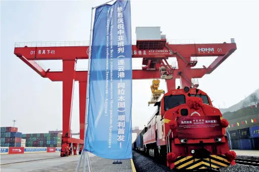  ??  ?? One of the first fleet of cargo trains rolls out from Lianyungan­g, Jiangsu Province towards Alma-Ata, Kazakhstan on February 25, 2015.