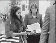  ?? AP/PABLO MARTINEZ MONSIVAIS ?? Sen. Lisa Murkowski, D-Alaska, waits Friday to board the Senate subway after listening to Sen. Susan Collins, R-Maine, declare she would vote to confirm Brett Kavanaugh’s nomination. Murkowski said no in a procedural vote.