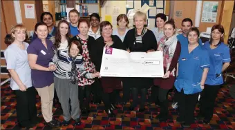  ??  ?? Staff of Summervill­e Healthcare, Strandhill, presenting a cheque for € 524 in memory of Joe Gilligan who was Director of Nursing at Summervill­e Healthcare, the money was donated from Summervill­e staff from their office Kris Kindle, included in photo...