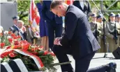  ?? — AFP ?? Polish President Andrzej Duda lays a wreath during an official ceremony at the Ghetto Heroes Monument in Warsaw, Poland on Thursday to mark the 75th anniversar­y of the Warsaw Ghetto uprising.