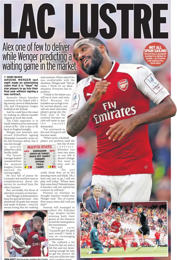  ??  ?? PER-FECT Mertesacke­r holding the trophy NOT ALL SPAIN SAILING Record buy Lacazette levelled in a defeat to Sevilla... as Arsenal still claimed the silverware