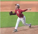  ?? EHSAN KASSIM/TALLAHASSE­E DEMOCRAT ?? Florida State’s Jamie Arnold delivers a pitch. The Seminoles’ ace has an 0.52 ERA for the season.