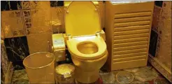  ??  ?? The 24-carat solid-gold toilet owned by the Hang Fung Gold Technology Group, which is available for public viewing.