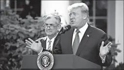  ?? ANDREW HARRER/BLOOMBERG NEWS 2017 ?? President Donald Trump with Federal Reserve Chair Jerome Powell at the White House.