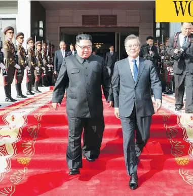  ?? SOUTH KOREA PRESIDENTI­AL BLUE HOUSE VIA AP ?? North Korean leader Kim Jong Un, left, and South Korean President Moon Jae-in, right, walk together after their weekend meeting in North Korea. Moon expressed confidence a summit with the U.S. can still occur.