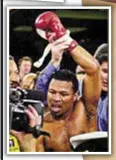  ??  ?? Sugar Shane Mosley, seen celebratin­g win in 2001 (above), claims ex-spouse Jin (r. and top) was already married to another man when she tied knot with boxing champ. That, he says, means she is not entitled to the $6 million she was awarded in their...