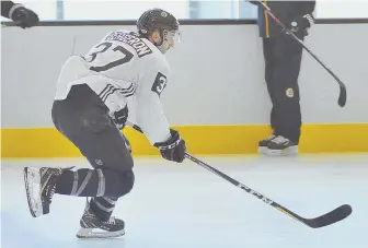  ?? HERALD PHOTO BY JOSEPH PREZIOSO ?? SORE SUBJECT: Patrice Bergeron, who practiced Tuesday before leaving with a lower-body injury, is day-to-day and his status remains up in the air heading into the Bruins’ season opener tonight against the Predators at the Garden.