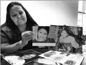  ?? ASSOCIATED PRESS ?? ROBERTA TORTICE HOLDS UP PHOTOS of her daughter, Katherine “Kat” Tortice at the federal courthouse in Phoenix on Tuesday.