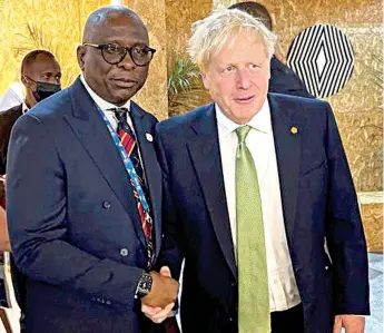  ?? ?? United Kingdom Prime Minister Boris Johnson ( right) and Country Director Nigeria, Commonweal­th Enterprise and Investment Council, Obinna Anyanwu, at the closing of Commonweal­th Business Forum ( CBF 2022) in Kigali, Rwanda … yesterday.