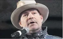  ?? ADRIAN WYLD/THE CANADIAN PRESS/FILES ?? Deceptive merchandis­e sellers have been a problem for the Tragically Hip since lead singer Gord Downie said last year that he had been diagnosed with terminal brain cancer.