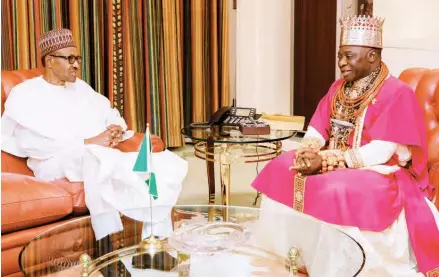  ?? NAN ?? President Muhammadu Buhari (left) with the Olu of Warri Kingdom, His Majesty Ogiame Ikenwole during a meeting at the Presidenti­al Villa in Abuja on Friday. PHOTO: