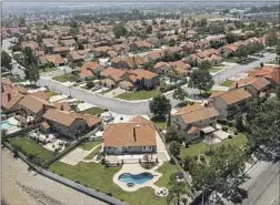  ?? Robert Gauthier Los Angeles Times ?? A HOUSING TRACT in Rancho Cucamonga that depends on the State Water Project, in which outdoor watering will be limited to one day a week.