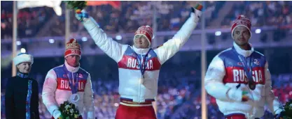  ?? Foto: lehtikuva/kirill kudryavtse­v ?? Inget Os. Alexander Legkov (i mitten), Maxim Vylegzjani­n (t.v.) och Ilja Tjernusov firade en trippelseg­er på 50 km i Sotji. Legkov och Vylegzjani­n har nu blivit avstängda på livstid av IOK.