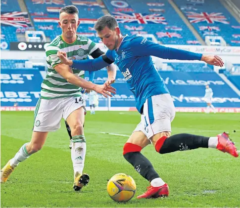  ??  ?? OLD FIRM: Rangers’ Borna Barisic, right, in action against David Turnbull of Celtic.