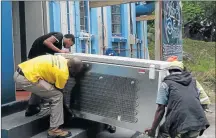  ?? Picture: SUPPLIED ?? CONFISCATE­D: Members of the public allegedly helped government officials remove a freezer full of 272 crayfish from the Waterfront Restaurant in Port St Johns despite it being legally bought from a company that has a permit to buy from Wild Coast subsistenc­e fishermen