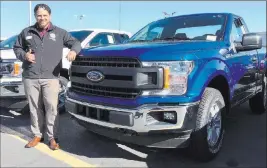  ?? Friendly Ford ?? Sales consultant Sheldon Pyke is seen with the 2018 Ford F-150 at Friendly Ford, 660 N. Decatur Blvd.