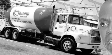  ??  ?? A Gaspro truck parked at a terminal. Massy Holdings wants to become a reseller of LNG in Jamaica in order to manage the substituti­on threat to its LPG brand.