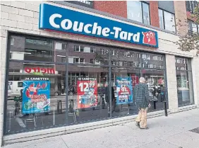  ?? GRAHAM HUGHES THE CANADIAN PRESS FILE PHOTO ?? To address the number of customers turning to “value-seeking” behaviour, Couche-Tard has focused on its private-label products, its loyalty program and Fuel Day promotions.