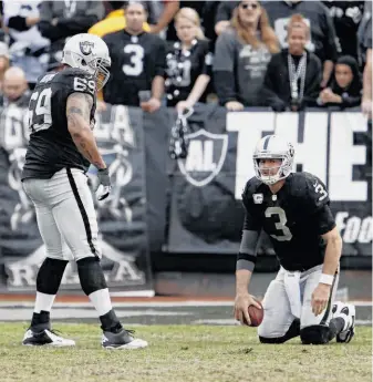  ?? Carlos Avila Gonzalez / The Chronicle ?? Carson Palmer said, “Right now, we’re shooting for 9-7,” but the reality is the Raiders once again have been brought to their knees, and a third straight 8-8 season seems unlikely.