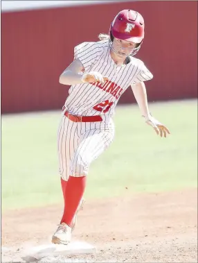  ?? FILE PHOTO ?? Kally Stout rounds third base during regional tournament action last May in Farmington. Stout is an all-state player who helped Farmington to two state runner-up finishes in softball and she was also all-conference in volleyball for the Lady Cardinals.