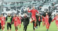  ?? (AFP) ?? Monza’s players celebrate at the end of the Italian Serie A match against Juventus at the Juventus Stadium in Turin on Sunday.