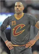  ?? DAVID RICHARD/USA TODAY SPORTS ?? Former Cavaliers forward LeBron James stands on the court after ripping his jersey sleeves during a 2015 game against the New York Knicks in Cleveland.