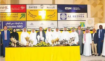  ?? Courtesy: Abdalla Khalifa ?? Shadwell Mirza Al Sayegh (sixth from left), Shareef Al Halawani (fifth from left), Yasir Mabrouk (right) and officials at a press conference ahead of tomorrow’s season opener at Jebel Ali.
