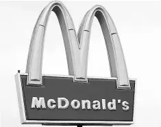  ??  ?? McDonald’s Corp announced a push to embrace apps aimed at speeding up service at drivethrus, which account for about 70 per cent of the fast-food chain’s US business, as it looks to woo back diners.