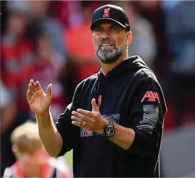  ?? Fotos: AFP ?? Jürgen Klopp führt Liverpool zurück in die Erfolgsspu­r und zum Rekordsieg.