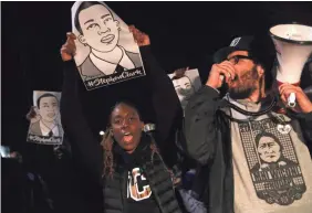  ?? JUSTIN SULLIVAN/GETTY IMAGES ?? Black Lives Matter activists protest the decision not to charge the Sacramento police officers who killed Stephon Clark last year.