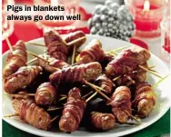  ??  ?? Pigs in blankets always go down well