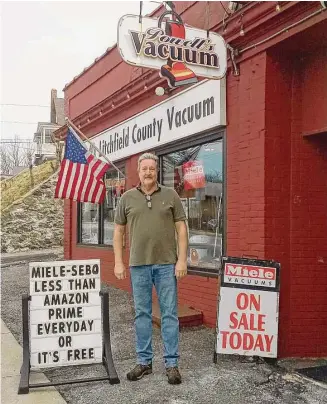  ?? Emily M. Olson/Hearst Connecticu­t Media ?? Steve Powell, owner of Powell’s Vacuum on East Main Street in Torrington, has been in business for 40 years. He says his success is based on experience, service and better vacuums.