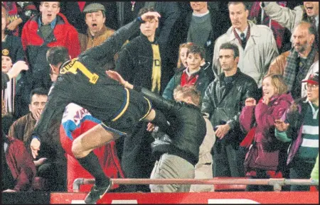  ??  ?? French connection...Eric Cantona’s infamous kung-fu lunge at a Crystal Palace fan saw the Man United maverick hit with a nine-month ban