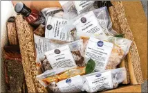  ?? COURTESY OF PIEDMONT KITCHEN CO. ?? Piedmont Kitchen Co. packs its food in bisphenol A-free plastic bags. “You can pull it out of the freezer, put the bag in boiling water, and it’s ready to eat in 15 minutes,” says co-owner Brad Coolidge.