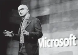  ?? Jason Redmond AFP/Getty Images ?? MICROSOFT CEO Satya Nadella at the annual shareholde­rs meeting. The company has stayed relevant by focusing on cloud services and its popular work tools.