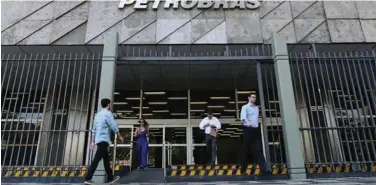  ?? Reuters ?? ↑ Brazil’s state-run Petrobras oil company headquarte­rs is pictured in Rio de Janeiro, Brazil.
