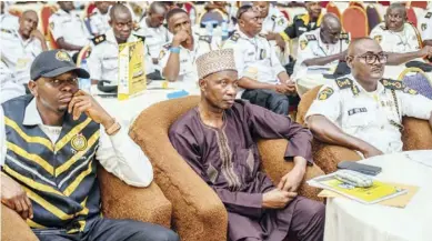  ?? ?? L-R: FCT squadron leader and national coordinato­r, road traffic officers and vehicle inspection officers (RTO\VIO), Dr. Yusuf John Suberu; retired deputy director, FCT DRTS, Dele Yaro and chairman of the conference, Engr. Paul Bepeh during the 2022 RTO/ VIO conference in Lokoja, Kogi state.