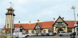  ??  ?? Wemyss Baystation with its clocktower. The flatwindow­s canbeseen abovethe ground floor. HUGHDOUGHE­RTY