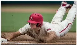  ?? NWA Democrat-Gazette/BEN GOFF ?? LEFT Arkansas first baseman Jared Gates dives back to first base in the fourth inning of Sunday’s victory over Texas. RIGHT Right fielder Eric Cole hits a lead-off double in the first inning to get things started for the Razorbacks.