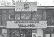  ?? GERARDO SANCHEZ/AP ?? The city hall of Villa Union, Mexico, is seen after a gun battle between security forces and a suspected gang.