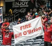  ?? Brett Coomer / Staff photograph­er ?? Little did these Texans fans on Sunday know that their wish would actually be granted the next day.