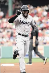  ?? BOB DECHIARA USA TODAY Network ?? Left fielder Bryan De La Cruz sparked the Marlins’ offense with a two-run homer in the first inning Tuesday night in a 10-1 victory in Boston.