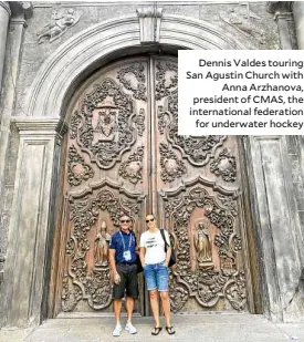  ??  ?? Dennis Valdes touring San Agustin Church with Anna Arzhanova, president of CMAS, the internatio­nal federation for underwater hockey