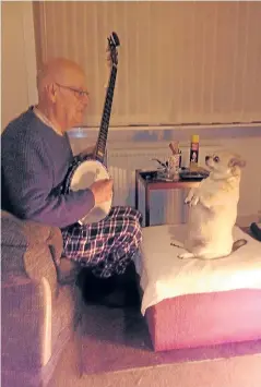  ??  ?? Begging to hear more banjo music is Susy, who lives with John Bell in New Pitsligo