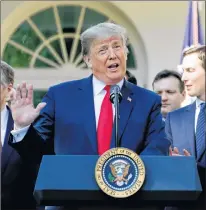  ?? PABLO MARTINEZ MONSIVAISA­P PHOTO ?? President Donald Trump speaks as he announces a revamped North American free trade deal, in the Rose Garden of the White House in Washington, Monday.