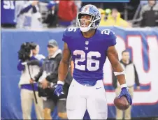  ?? Bill Kostroun / Associated Press ?? The Giants face a decision in the notsodista­nt future of how big a contract extension to throw at Saquon Barkley.