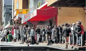  ??  ?? There was no physical distancing at one of the Department of Health’s clinics in Port Elizabeth’s central business district this week as people waited for treatment. Photo: Donna van der Watt